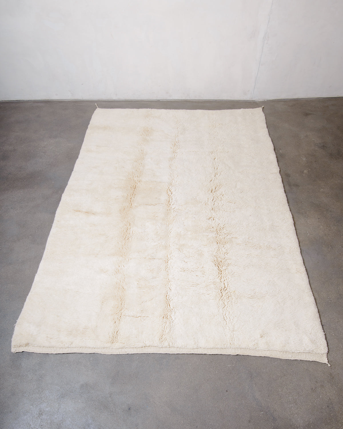 Modern, designer, handcrafted 100% sheep’s wool Berber rug from Morocco. Beni M’rirt carpet with beautiful colours and patterns and fluffy wool texture.